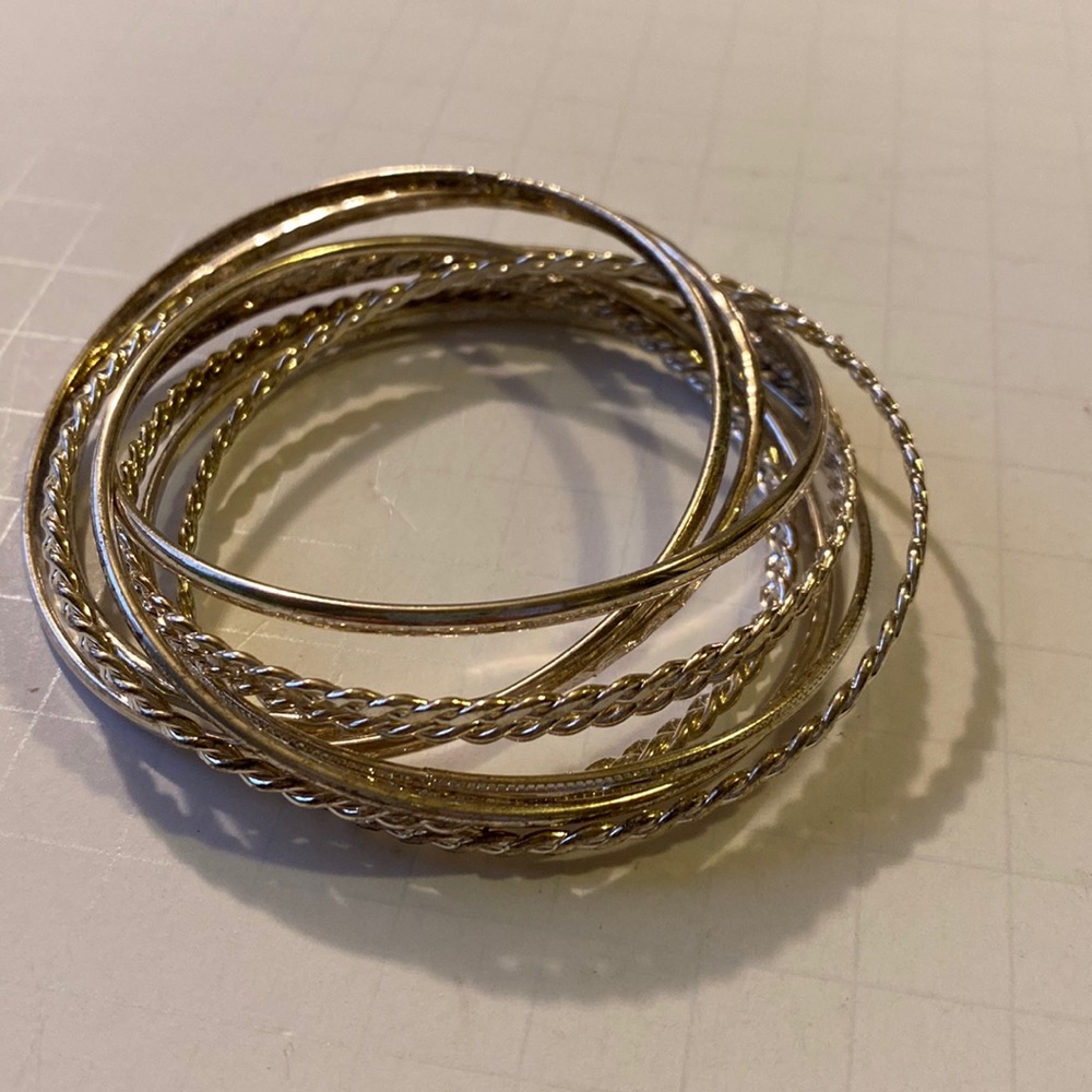 Set of Ten Connected Silver toned bracelets of various designs